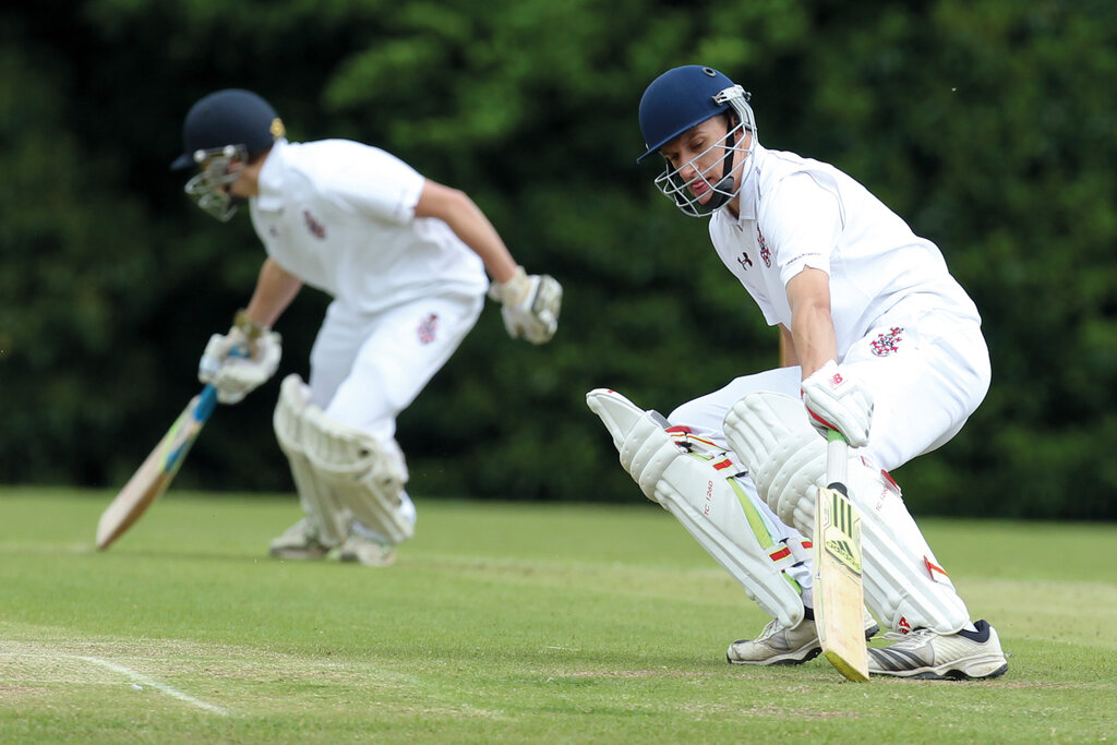 Kids playing Cricket